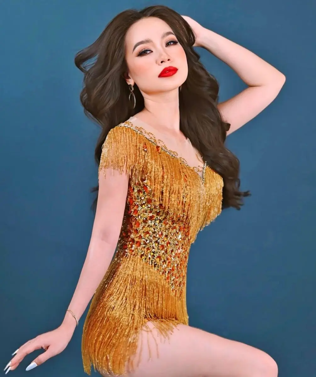 Ca sĩ Lina Nguyễn về thăm quê hương sau những ngày định cư Mỹ 24 Phu nu hien dai lina nguyen 11